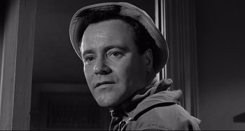 Movie still from “Days of Wine and Roses” (1962), directed by Blake Edwards – Black and white photograph of a man wearing a hat; Close Up shot, Low angle