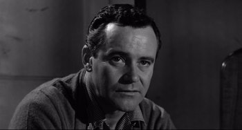 Movie still from “Days of Wine and Roses” (1962), directed by Blake Edwards – An old black and white photo of a man; Close Up shot, Low angle