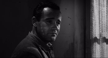 Movie still from “Days of Wine and Roses” (1962), directed by Blake Edwards – Black and white photograph of a man in a jacket; Close Up shot, Low angle