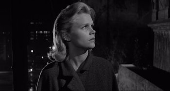 Movie still from “Days of Wine and Roses” (1962), directed by Blake Edwards – A black - and - white photo of a woman looking up at the sky; Close Up shot, Low angle