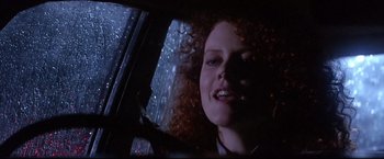 Movie still from “Dead Calm” (1989), directed by Phillip Noyce – A person with curly red hair; Close Up shot, Low angle