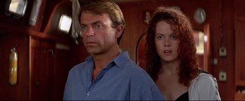 Movie still from “Dead Calm” (1989), directed by Phillip Noyce – A man and a woman standing next to each other in a room; Close Up shot, Low angle