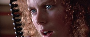 Movie still from “Dead Calm” (1989), directed by Phillip Noyce – A child's face with blue eyes; Extreme Close Up shot, Low angle