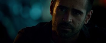 Movie still from “Dead Man Down” (2013), directed by Niels Arden Oplev – A man's face in the dark; Close Up shot, Over the shoulder angle