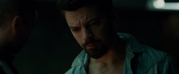 Movie still from “Dead Man Down” (2013), directed by Niels Arden Oplev – A person with a beard; Close Up shot, Low angle