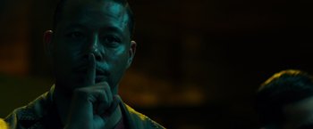 Movie still from “Dead Man Down” (2013), directed by Niels Arden Oplev – A man with green paint all over his face; Close Up shot, Low angle