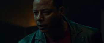 Movie still from “Dead Man Down” (2013), directed by Niels Arden Oplev – A person wearing a red shirt; Close Up shot, High angle