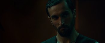 Movie still from “Dead Man Down” (2013), directed by Niels Arden Oplev – A person with a beard; Close Up shot, Low angle