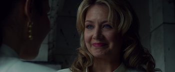 Movie still from “Dead Man Down” (2013), directed by Niels Arden Oplev – A person wearing a white shirt; Close Up shot, Over the shoulder angle