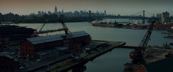 Movie still from “Dead Man Down” (2013), directed by Niels Arden Oplev – A view of a city from a bridge; Extreme Wide shot, High angle