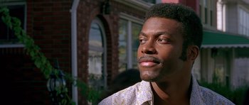 Movie still from “Dead Presidents” (1995), directed by Albert Hughes – A person wearing a shirt; Close Up shot, Low angle