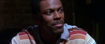 Movie still from “Dead Presidents” (1995), directed by Albert Hughes – A person wearing a striped shirt; Close Up shot, Low angle