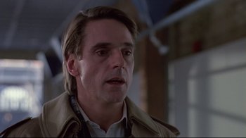 Movie still from “Dead Ringers” (1988), directed by David Cronenberg – A person wearing a jacket; Close Up shot, Over the shoulder angle