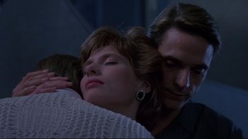 Movie still from “Dead Ringers” (1988), directed by David Cronenberg – A man and a woman are sleeping together; Close Up shot, Low angle