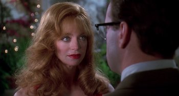 Movie still from “Death Becomes Her” (1992), directed by Robert Zemeckis – A man and a woman looking at one another; Close Up shot, Over the shoulder angle