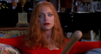 Movie still from “Death Becomes Her” (1992), directed by Robert Zemeckis – A person with long red hair; Close Up shot, Over the shoulder angle