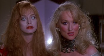 Movie still from “Death Becomes Her” (1992), directed by Robert Zemeckis – A couple of women standing next to each other; Close Up shot, Low angle
