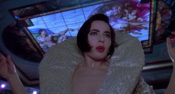 Movie still from “Death Becomes Her” (1992), directed by Robert Zemeckis – A person wearing a dress; Close Up shot, Low angle