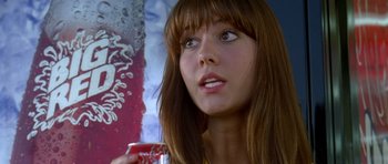 Movie still from “Death Proof” (2007), directed by Quentin Tarantino – A person holding a cup in her hand; Close Up shot, Over the shoulder angle
