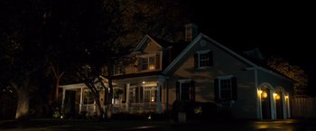 Movie still from “Death Wish” (2018), directed by Eli Roth – A house at night lit by a street light; Extreme Wide shot, Low angle