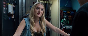 Movie still from “Death Wish” (2018), directed by Eli Roth – A beautiful blonde woman with long hair; Close Up shot, Over the shoulder angle