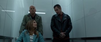 Movie still from “Death Wish” (2018), directed by Eli Roth – A man and a woman standing next to each other; Medium shot, Low angle