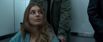 Movie still from “Death Wish” (2018), directed by Eli Roth – A woman sitting next to a man on a train; Close Up shot, Over the shoulder angle