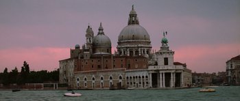 Movie still from “Death in Venice” (1971), directed by Luchino Visconti – A view of a large building with a dome on top of it; Extreme Wide shot, Low angle