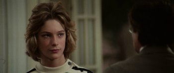 Movie still from “Death in Venice” (1971), directed by Luchino Visconti – A person with short hair; Close Up shot, Over the shoulder angle