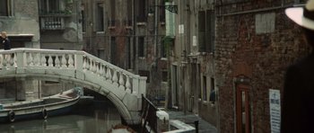 Movie still from “Death in Venice” (1971), directed by Luchino Visconti – A bridge over a river in a city; Extreme Wide shot, High angle