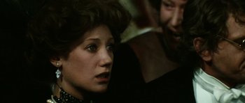 Movie still from “Death in Venice” (1971), directed by Luchino Visconti – A person wearing a wig; Close Up shot, Over the shoulder angle