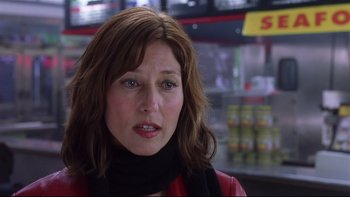 Movie still from “Death to Smoochy” (2002), directed by Danny DeVito – A person wearing a red jacket; Close Up shot, Over the shoulder angle