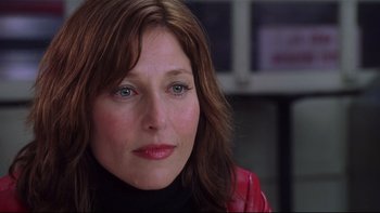 Movie still from “Death to Smoochy” (2002), directed by Danny DeVito – A person wearing a red jacket; Close Up shot, Over the shoulder angle