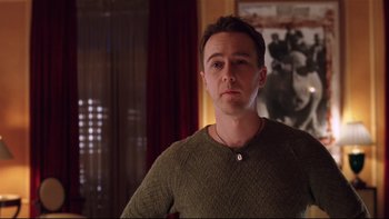 Movie still from “Death to Smoochy” (2002), directed by Danny DeVito – A person wearing a sweater; Medium shot, Over the shoulder angle