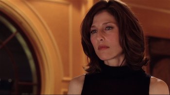 Movie still from “Death to Smoochy” (2002), directed by Danny DeVito – A person wearing a black shirt; Close Up shot, Low angle