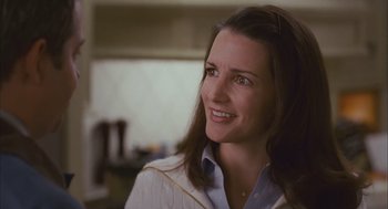 Movie still from “Deck the Halls” (2006), directed by John Whitesell – A person smiling at the camera; Close Up shot, Over the shoulder angle