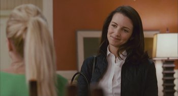 Movie still from “Deck the Halls” (2006), directed by John Whitesell – A beautiful woman in a white shirt and a black jacket; Close Up shot, Over the shoulder angle