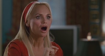 Movie still from “Deck the Halls” (2006), directed by John Whitesell – A woman with her mouth wide open looking surprised; Close Up shot, Over the shoulder angle