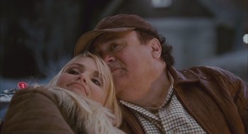 Movie still from “Deck the Halls” (2006), directed by John Whitesell – A man and a woman sitting next to each other; Close Up shot, Over the shoulder angle