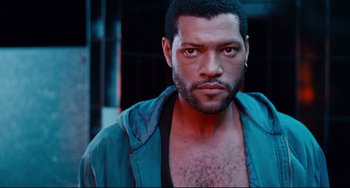 Movie still from “Deep Cover” (1992), directed by Bill Duke – A person wearing a jacket; Close Up shot, Overhead angle