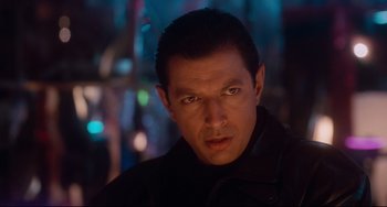 Movie still from “Deep Cover” (1992), directed by Bill Duke – A person wearing a black jacket; Close Up shot, Low angle