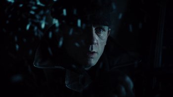 Movie still from “Defiance” (2008), directed by Edward Zwick – A person wearing a hat; Close Up shot, Low angle