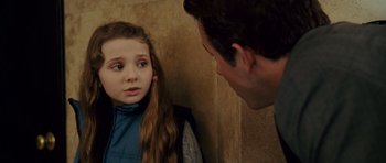 Movie still from “Definitely, Maybe” (2008), directed by Adam Brooks – A man and a little girl looking at each other; Close Up shot, Over the shoulder angle