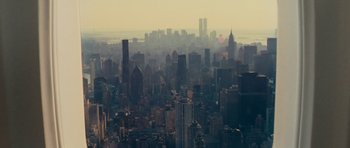 Movie still from “Definitely, Maybe” (2008), directed by Adam Brooks – A view of a large city from a helicopter; Extreme Wide shot, High angle