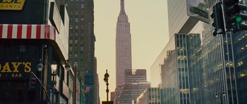 Movie still from “Definitely, Maybe” (2008), directed by Adam Brooks – A view of the empire state building from a street corner; Extreme Wide shot, Low angle