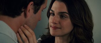 Movie still from “Definitely, Maybe” (2008), directed by Adam Brooks – A man and a woman looking at one another; Close Up shot, Over the shoulder angle