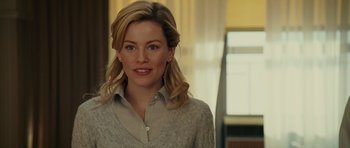 Movie still from “Definitely, Maybe” (2008), directed by Adam Brooks – A woman with blonde hair wearing a beige shirt; Close Up shot, Over the shoulder angle