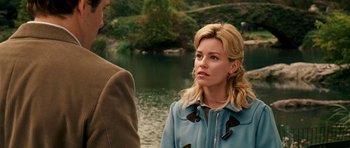 Movie still from “Definitely, Maybe” (2008), directed by Adam Brooks – A woman standing next to a man near a body of water; Close Up shot, Over the shoulder angle