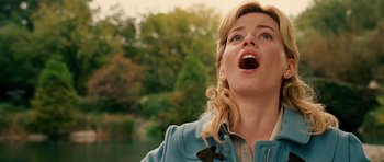 Movie still from “Definitely, Maybe” (2008), directed by Adam Brooks – A woman with her mouth wide open looking up; Close Up shot, Low angle