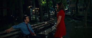 Movie still from “Definitely, Maybe” (2008), directed by Adam Brooks – A man and a woman sitting on a park bench at night; Wide shot, Over the shoulder angle